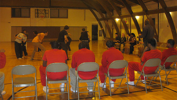 Residents watch Ithaca College students perform traditional African dance.
Photo Credit - Samantha Underwood