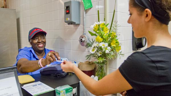 Campus Center employee comforts students with lunchtime greetings