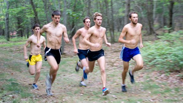 From left, senior Mark Vorensky, Bill Way ’10 and seniors Billy Savage, David Geary and Nate Bickell run on the Ithaca College Cross Country Course during a team practice Aug. 24. 