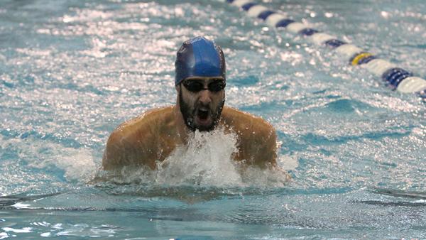 Senior Jake Lichter competes in the 100-yard breaststroke during the men’s swimming and diving team’s 203-95 victory against Rensselaer Polytechnic Institute on Saturday. Lichter won the event with a time of 1:02.06.
