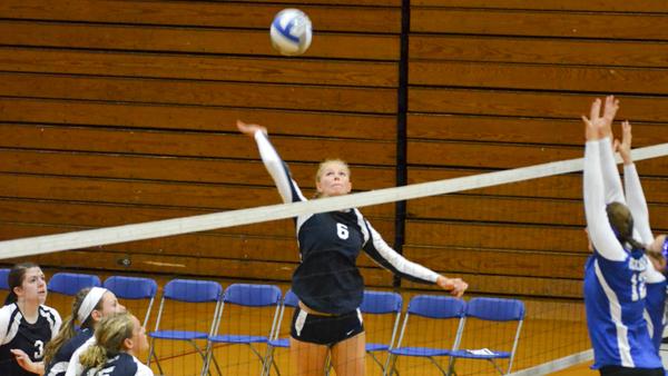 Senior outside hitter Marissa Weil loads up for a kill during the Bomber Invitational on Sept. 8 in Ben Light Gymnasium. Weil leads the Bombers with 189 kills this season.