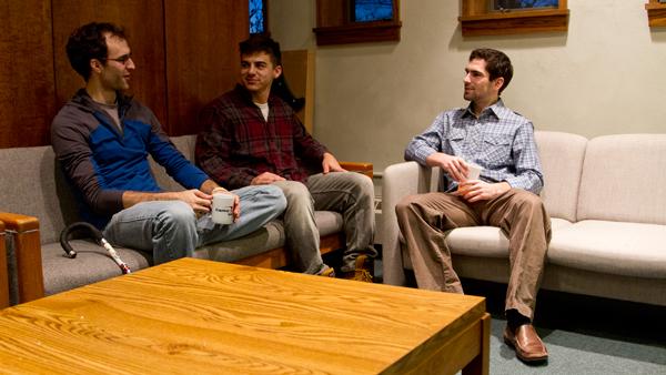 From left, senior Chris Accardo, junior Peter Arseneault and junior Suleyman Yoruk talk with each other at a Guy Talk meeting Nov. 6 in Muller Chapel.