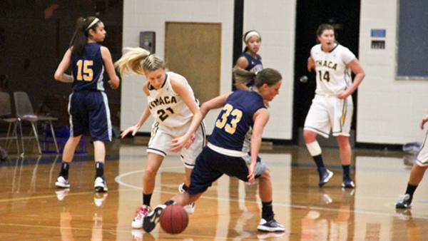 Sophomore guard Allie Mnich steals the ball from an opponent