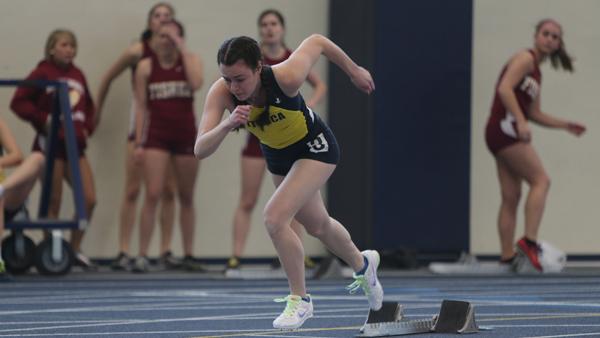 Ithaca sophomore Kassie Moore launches from the starting blocks in the Womens 800m race. The Womens Track & Field won their ninth Empire 8 Indoor Track & Field Championship Saturday in the Athletics and Events Center.