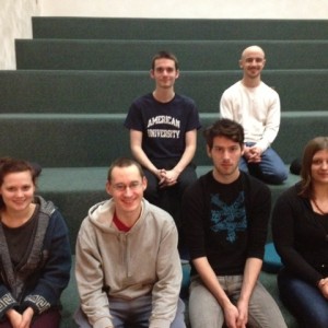 Junior Kevin Walker, second from left, sits with IC Buddhist Community members. The group is focusing on the doctrine of no-self this semester. Courtesy of Kevin Walker