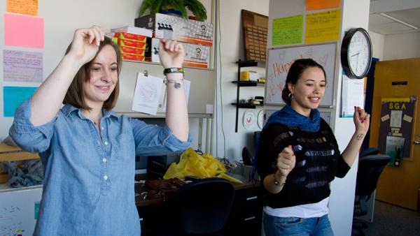 From left, seniors Elizabeth Stoltz and Shyanne Reiz practice the choreography for the V-Day flashmob, which will be held at 12:30 Thursday in IC Square. 