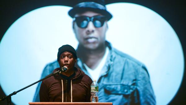 Rapper Talib Kweli speaks Feb. 7 to a crowd in Emerson Suites. Kweli said his favorite part of speaking is the dialogue with students that follows.
