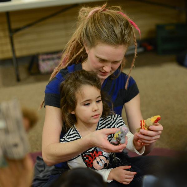 From left, Julianna Almeida holds her 10-month-old son, Zach Jemetz; Tien Ngo sits with her 2-year-old daughter, Quyah Matsudaira; and instructor Angie Beeler teaches her class.

