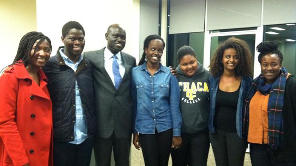Ithaca College students stand with Amii Omara-Otunnu, third from left. During his visit, Omara-Otunnu discussed human rights and the increasing interdependence within the global community.
