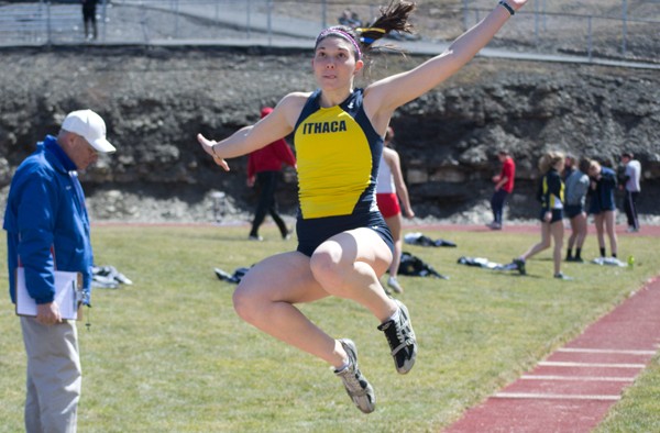 Senior cocaptain Amanda Rissmeyer competes in the long-jump event during the Ithaca Invitational on March 30 at Butterfield Stadium. 

