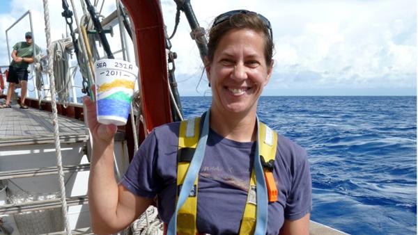 Susan Swensen, biology professor, stands on a ship bound for the island of Raieta, located in Polynesia, as part of a Sea Education Association trip.