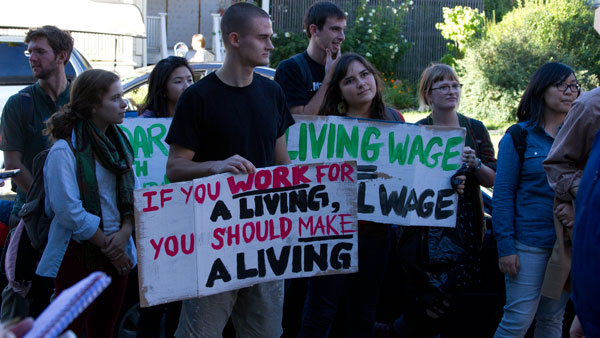 The Tompkins County Workers Center leads a rally for the living wage on Tuesday afternoon, outside the Tompkins County Legislature