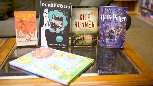 From left, “The Catcher in the Rye,” “The Lorax,” “Persepolis,” “The Kite Runner” and “Harry Potter and the Sorcerer’s Stone” are included on banned books lists in high schools. Ithaca College will host its first Banned Books Read Out.	