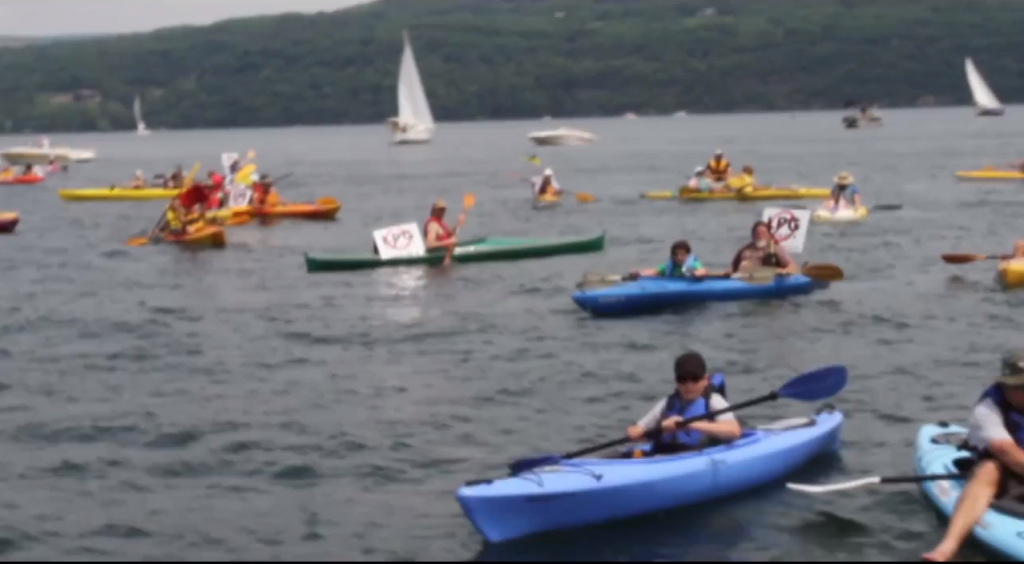 Members of the Ithaca community joined with representatives of Gas Free Seneca in a flotilla protest against Inergy LP Saturday, June 22.