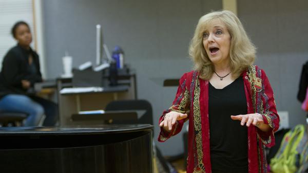 Janet Galvan, professor of music education and performance, conducts a rehearsal Tuesday in Beeler Hall in the Whalen Center for Music. Galvan has taught at IC since 1983.