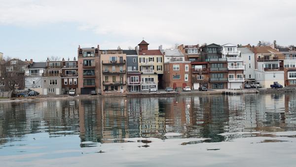 Houses, businesses and apartments sit on Skaneateles Lake, a major attraction for tourists. Skaneateles has a population of 2,700 and is located about an hour away from Ithaca. 