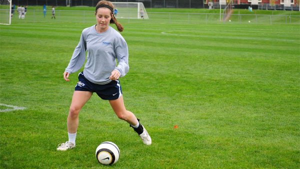 Sophomore forward Sarah Woychick dribbles the ball during practice Monday afternoon on the Upper Terrace Fields. Woychick was cut from the team as a freshman, but made it this year. 