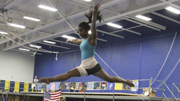 Senior all-around gymnast Rani Jacobson practices her beam routine during the gymnastic team’s workout Feb. 10 in Ben Light Gymnasium. Jacobson is one of the many gymnasts who is fighting off injuries this season.