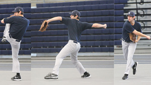 Freshman pitcher Logan Barer practices his delivery during baseball practice March 4 in Glazer Arena. Barer will begin the season pitching out of the bullpen. 