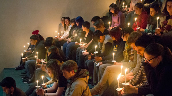 Students, faculty and staff gathered Dec. 3 for a candlelight vigil  honoring Michael Clark. A writing contest will be held in his memory.