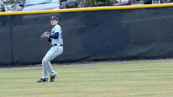Sophomore outfielder Christian Brown sets to throw during a game against SUNY Oswego on March 29, 2013, on Freeman Field. Brown is one of three Bombers from Columbia High School.