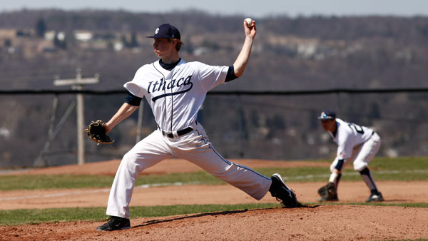 Sophomore pitcher Benji Parkes delivers his pitch during the first game of the Bombers’ doubleheader against Utica College on April 12 at Freeman Field. The Blue and Gold won both games 3–2 and 7–3, respectively.