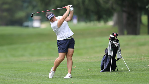 Junior Sharon Li hits a fairway shot during the Blue and Gold’s practice Oct. 1 at the Country Club of Ithaca. 