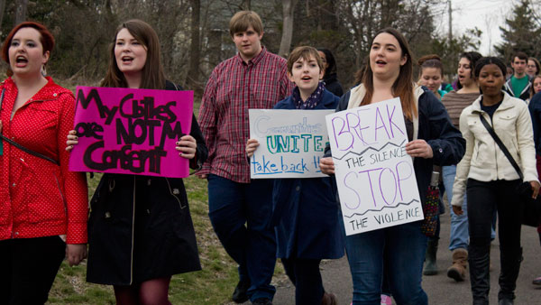 Ithaca College students rally for victims of sexual violence April 25 during their march down Hudson Street to Dewitt Park in Take Back the Night sponsored by the Advocacy Center of Tompkins County.