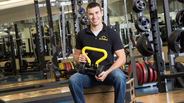 Sixth-year student Tim Reynolds won $20,000 at the first Business Plan Competition, which was held April 22 in Emerson Suites. His product, KettleShell, is a device to make using dumbbells easier. 