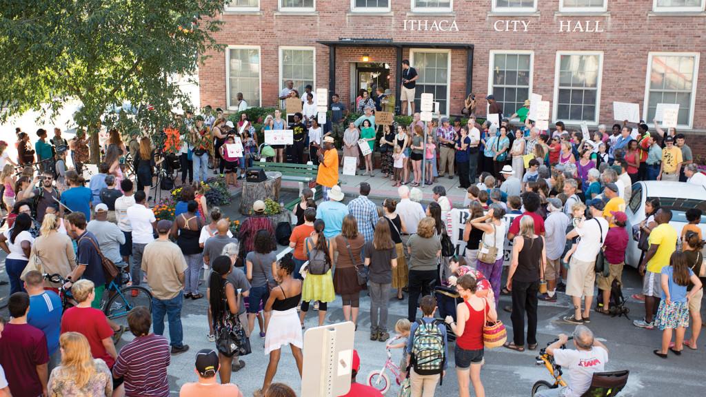 Protesters+gather+outside+of+the+Ithaca+City+Hall+to+show+support+for+the+families+of+the+teenagers+involved+in+the+Aug.+9+incident.+Over+200+people+held+signs+and+spoke+in+support+of+the+cause.