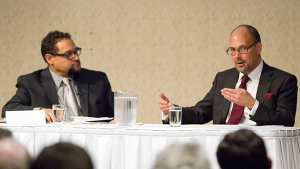 From left: Carlos Figueroa, assistant professor of politics at Ithaca College, and Jens David Ohlin, professor of law at Cornell University, host a discussion session at Ithaca College on Sept. 17. 