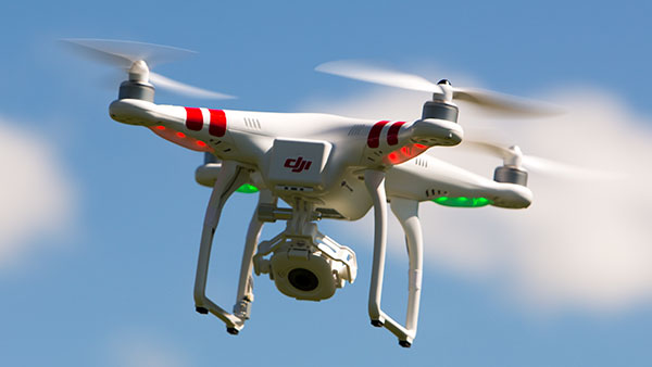 The Ithacan's newly purchased drone flies above the Carp Wood field to capture an aerial view.