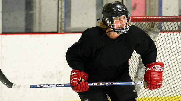 Katharine Kittredge, English professor at Ithaca College, plays twice a week from September through April in a men’s hockey league in Binghamton, New York. 