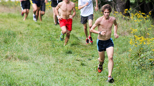 Junior runner Sawyer Hitchcock trains during the men’s cross-country team’s practice at the Ithaca College Cross-Country course on Sept. 10.