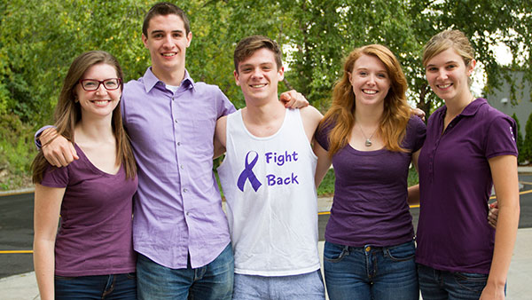 Left to right: Mikayla Lydon, Michael Stern, Jamie Powell, Ashley Watson and Caitlyn Patullo wear the color purple to support the fight against Alzheimers disease