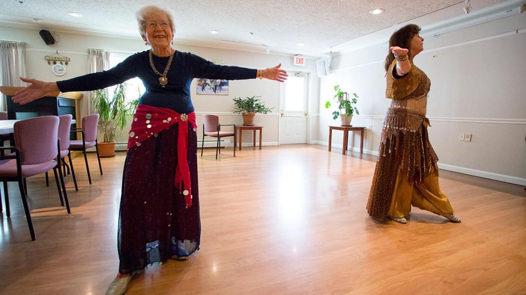From left, Longview resident Dorthea Rudge belly dances with Katharyn Machan, professor of writing. Rudge, who is 97 years old, has been participating in Machans Longview belly dance classes since she began teaching there.  