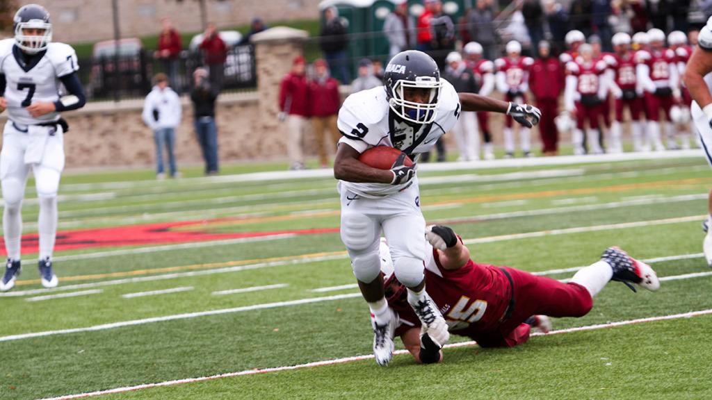 Junior wide receiver Josh Oliver beats a St. John Fisher defender in the Bombers 19–8 win over the Cardinals on Nov. 8.