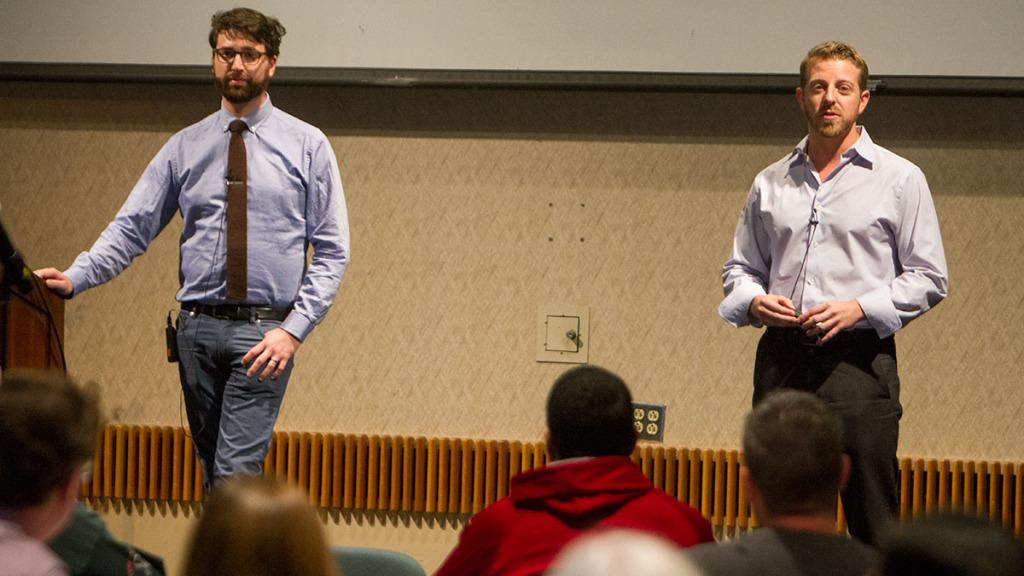 From left, Josh Jackson and David Levo, architects from the Perkins Eastman firm, present possible campus changes.