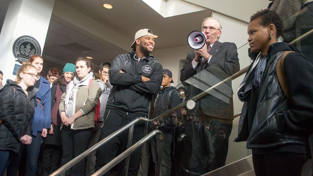 Ithaca College President Tom Rochon addresses a crowd of students during a demonstration against racial injustice on Dec. 4 in the Peggy Ryan Williams Center.
