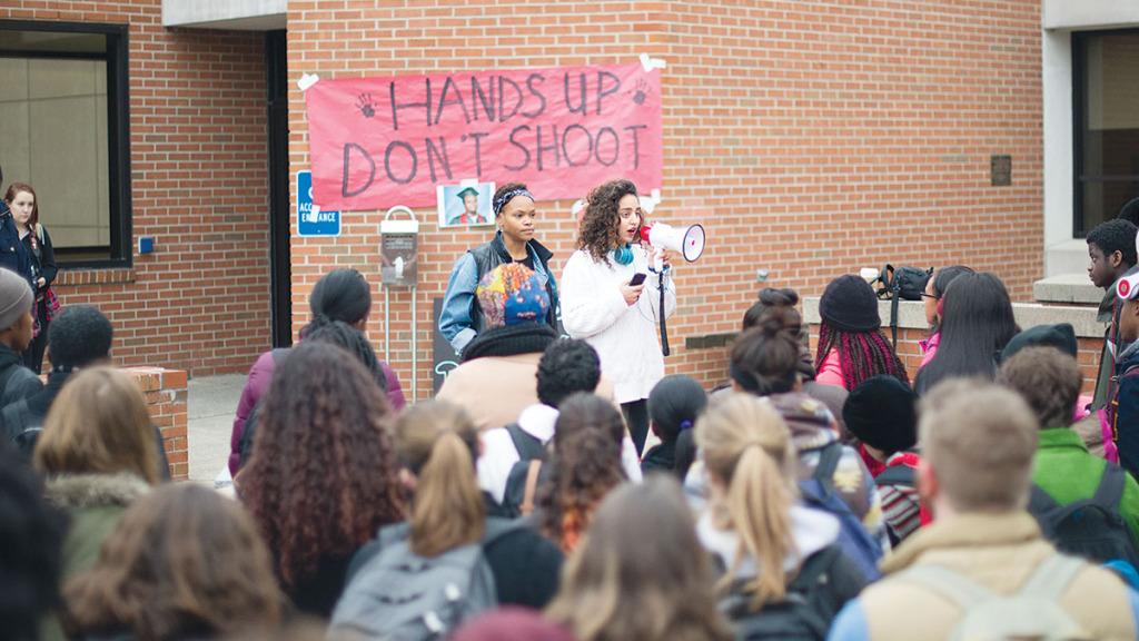 Sophomore Luna Olavarria Gallegos speaks at the Hands Up Walk Out rally on Dec. 1 at Free Speech Rock.