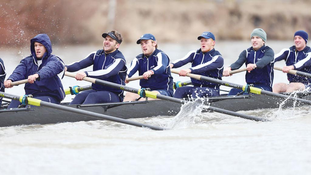 Members of men’s crew row against the University of Rochester on April 5, 2014. The South Hill squad graduated seven of eight rowers from its first varsity boat.