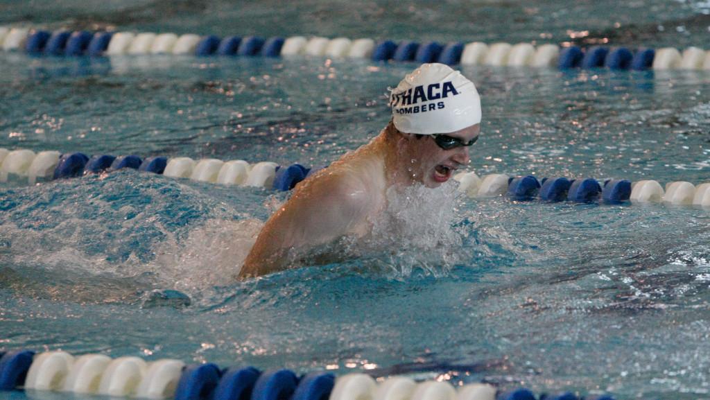 Freshman swimmer Aidan Hartswick swims breaststroke in the men’s swimming and diving team’s meet against SUNY Brockport on Oct. 18, 2014. The men’s team is currently undefeated.	