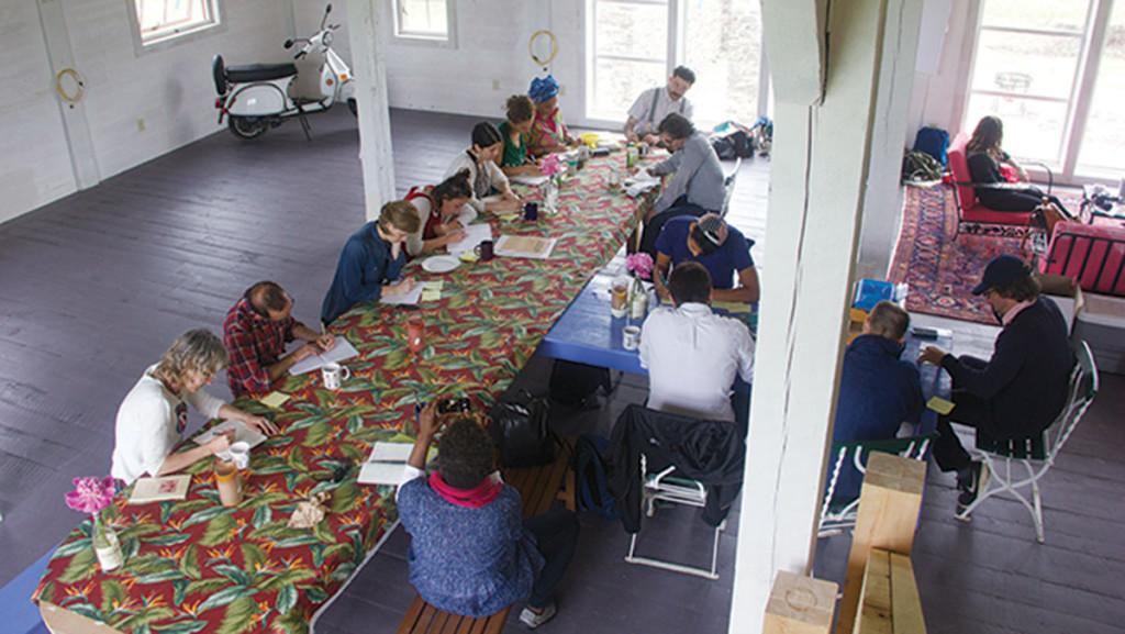 Participants of Image Text Ithaca’s 2014 session collaborate over their creative projects.