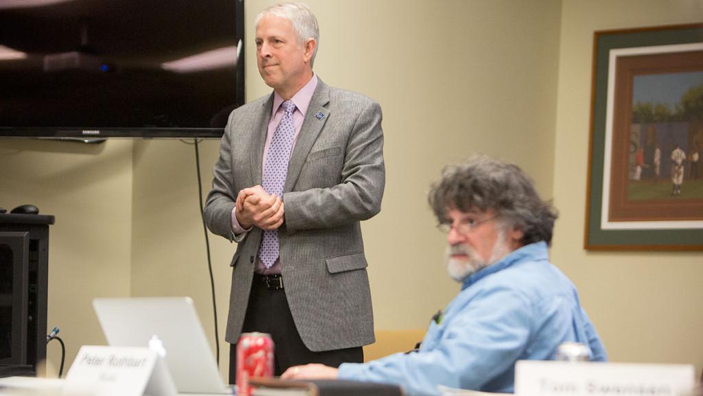 From left, Chris Biehn, vice president for institutional advancement, presents the goals of the comprehensive campaign next to Faculty Council chair Peter Rothbart at the Feb. 3 meeting.
