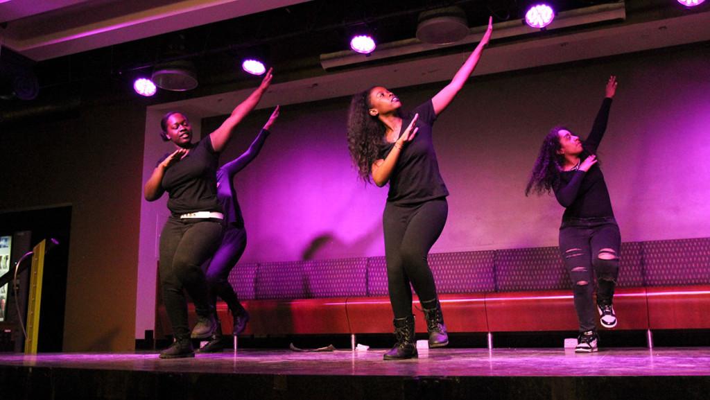 Members of Island Fusion perform onstage in IC Squared. The groups dances are inspired by Caribbean and African culture.
