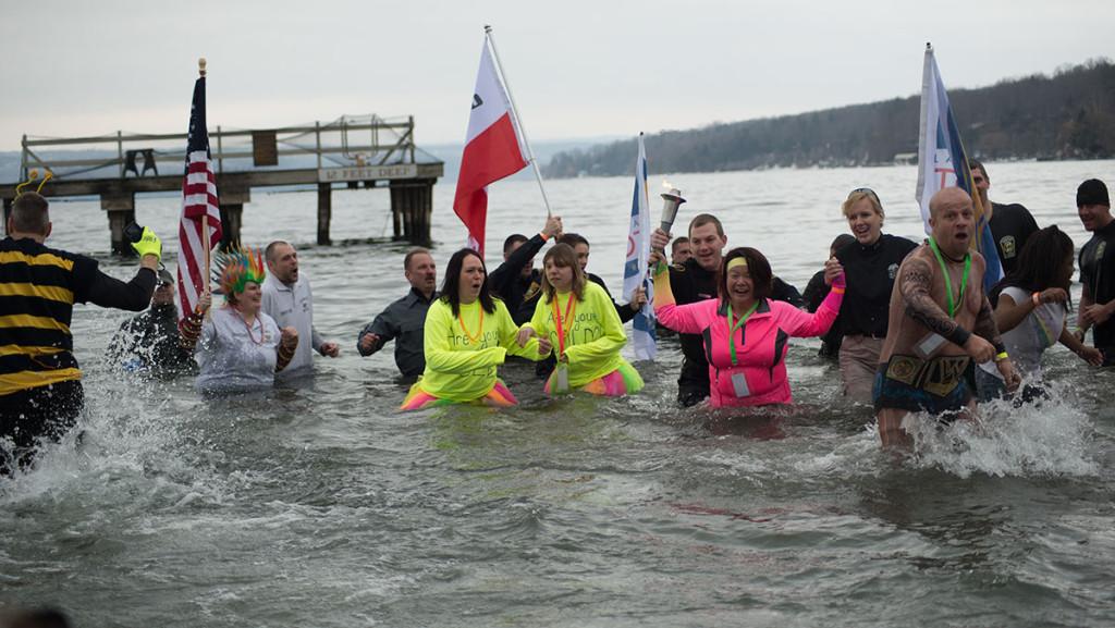 Hundreds of Ithacans, among them more than 40 Ithaca College students, plunged into the 30 degree water of Cayuga Lake on March 21 for Ithaca’s second annual Polar Plunge. 