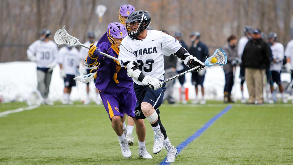 Freshman midfielder Marc Ross carries the ball for the men’s lacrosse team March 21 at Higgins Stadium. The nationally-ranked Blue and Gold defeated Elmira College by a score of 19–1.