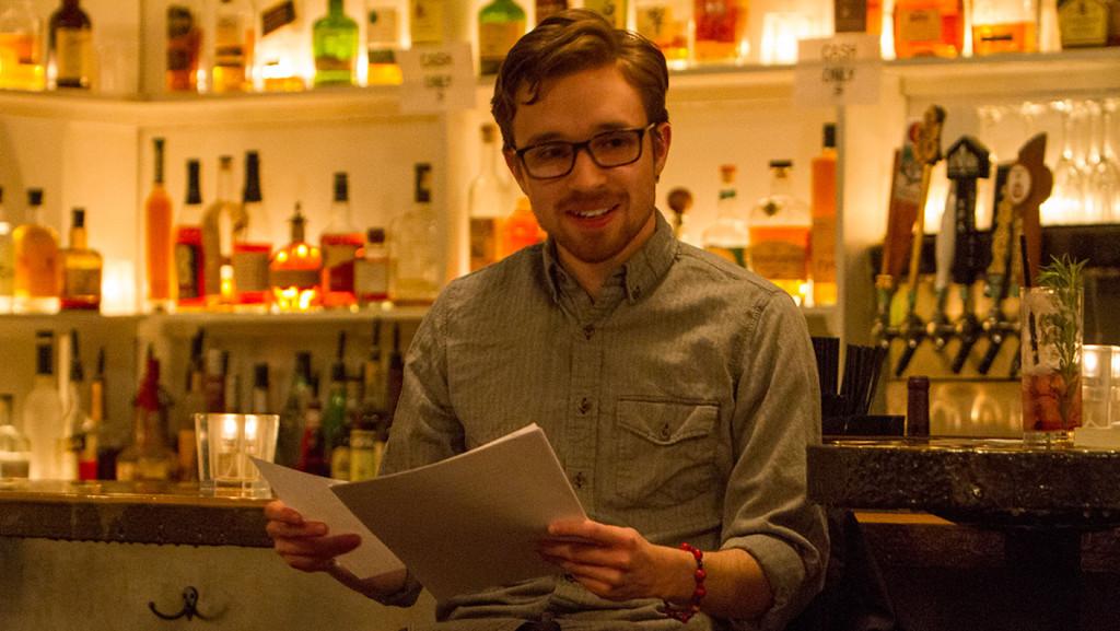 Junior Robert Hummel reads his poetry March 16 in Stella's Restaurant, Bar and Cafe. Hummel published a collection of his writing in 2014.