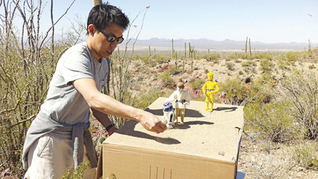Associate professor Jack Wang poses a felt R2-D2 during a shoot in Arizona. Each of the  fabric adaptations take 20 to 60 hours to make. 