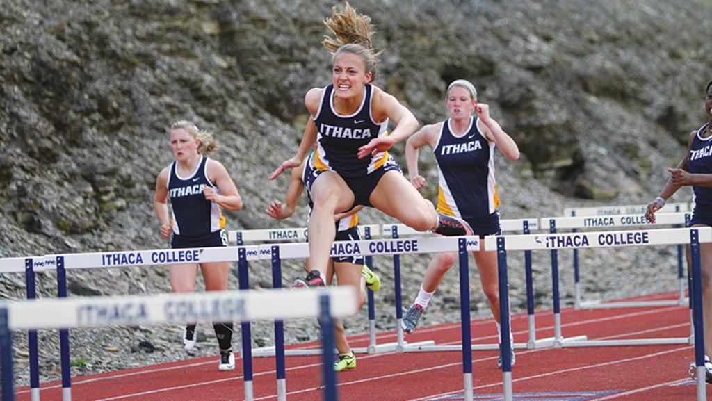 Senior hurdler Christine Benway races in the 100-meter hurdles at the Ithaca Tuesday Meet on April 21. Benway took first in the competition.